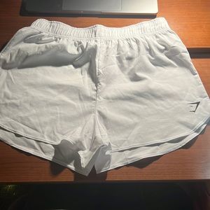 White gym shark shorts, size medium
